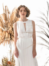 Sleeveless Pleated Silk Dress with Keyhole Neckline and A-Line Skirt